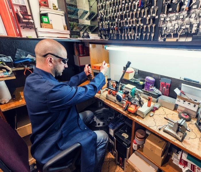 locksmith technician making new key north york